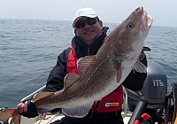 青岛海钓鳕鱼技巧分析渔具线组配置饵料选择